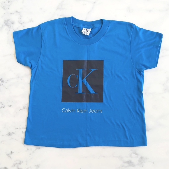 NWT. Calvin Klein 100% Cotton Cropped Short Sleeve Tee with painted front logo. - Picture 3 of 3
